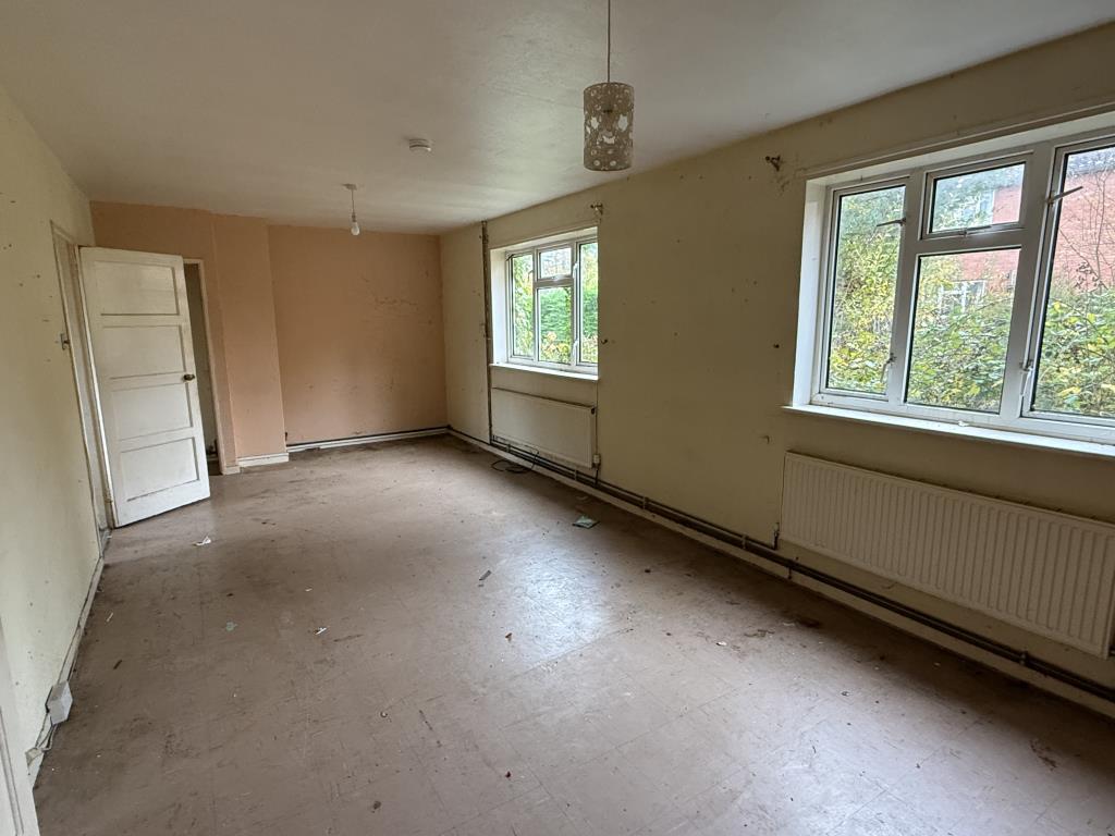 Lot: 129 - HOUSE IN NEED OF REFURBISHMENT - Living Room-Dining Room in Semi in need of Refurbishment